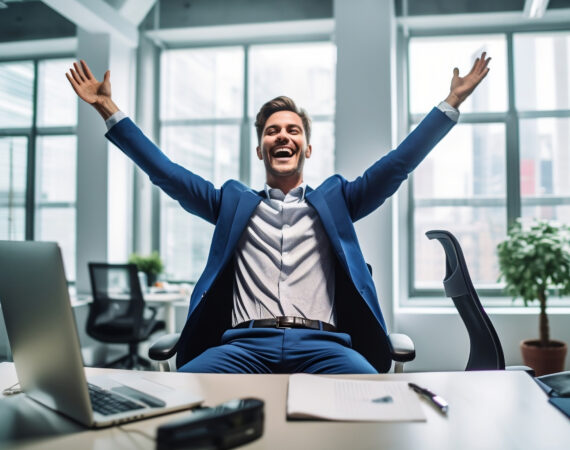 Career satisfaction, happy business man celebrating at his desk