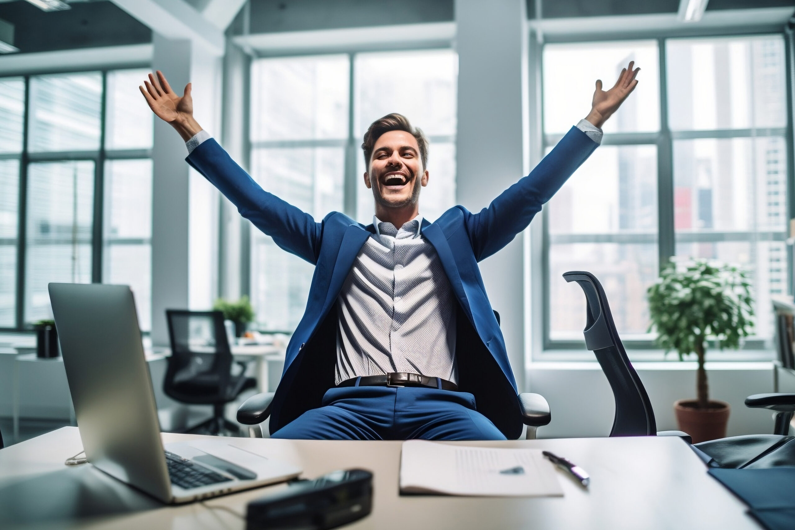 Career satisfaction, happy business man celebrating at his desk